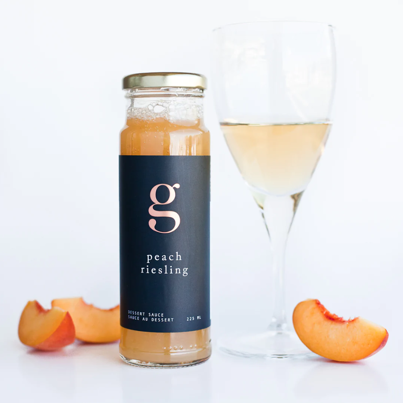 Gourmet Inspirations Peach Riesling sauce with wine glass and peaches