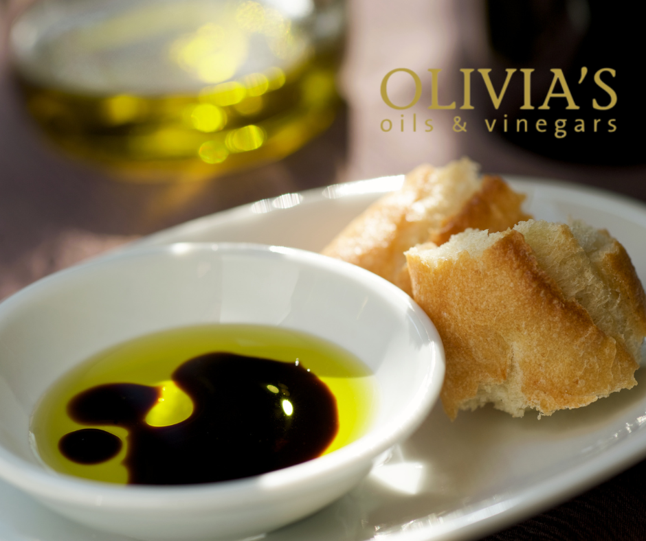 Olivia's oils and vinegars on a plate with bread